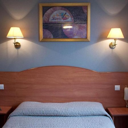 Camelia Hotel Paris Room photo